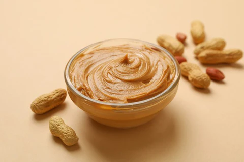 peanut bowl with peanut butter beige background 185193 24072 480x480